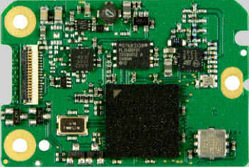Electronic circuit board with various chips and circuits on green base.