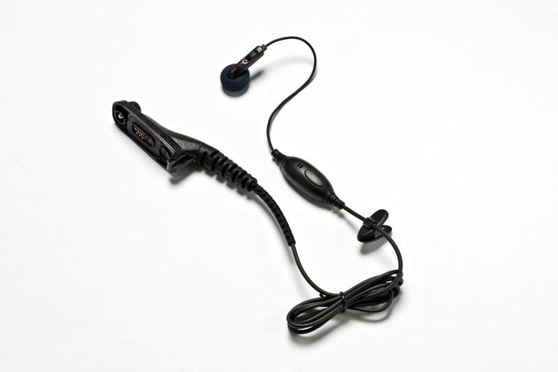 Black headset with earbud, microphone, and clip, connected by wire.