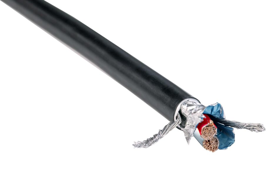 Close-up of a cut multi-core cable with insulation and shielding.