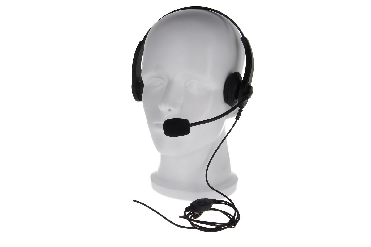 Plastic hoofd met zwarte headset en microfoon.