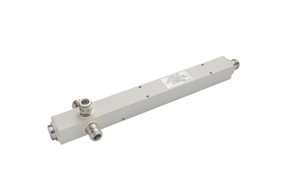 Appareil technique gris, rectangulaire, avec connecteurs aux extrémités et étiquette au centre.