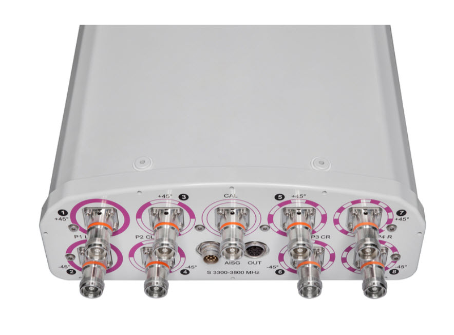 Appareil électronique avec plusieurs ports, certains marqués en rose et étiquetés.