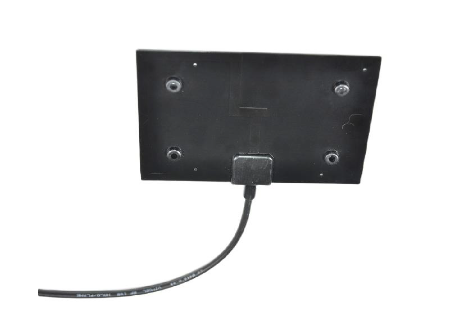 Black rectangular plate with cable connection at the bottom.