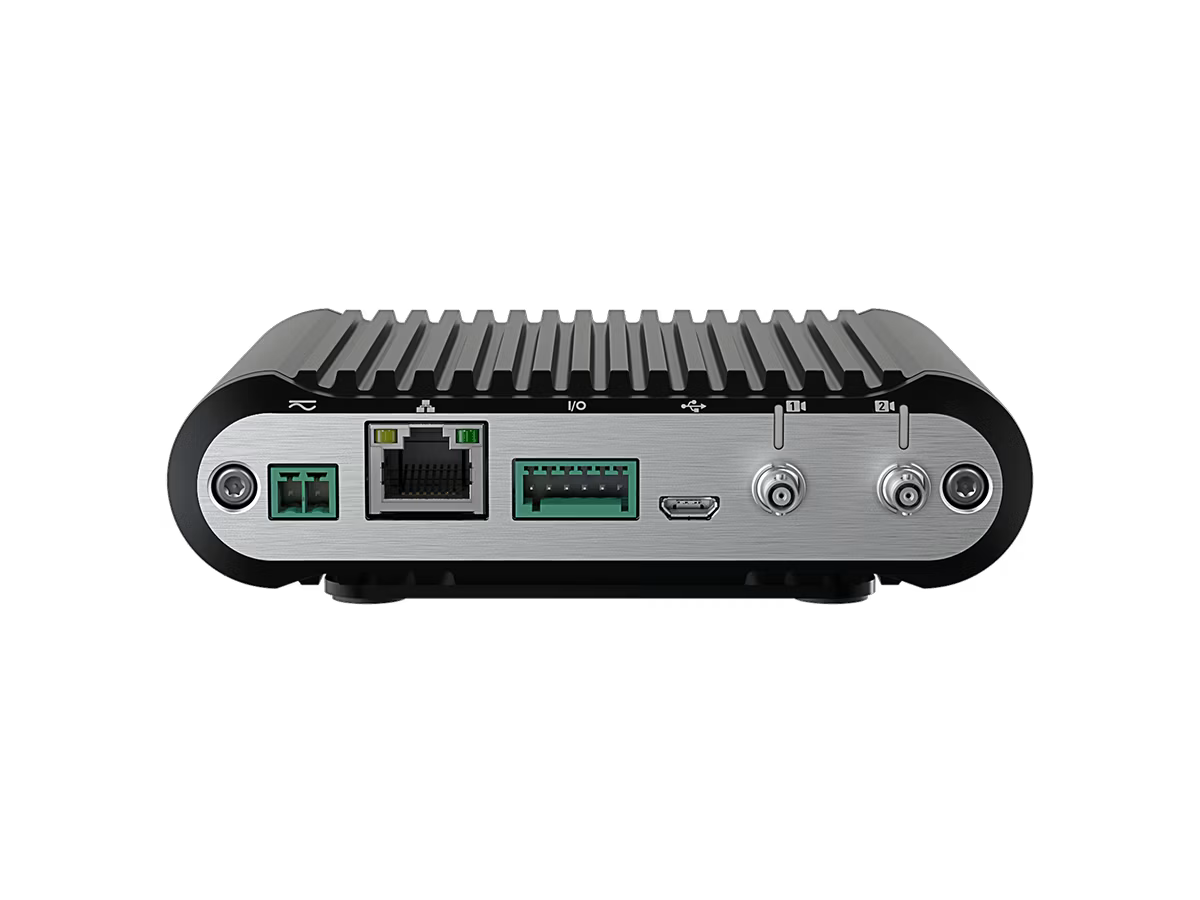 Electronic device with multiple ports on a metallic surface, including Ethernet and USB.