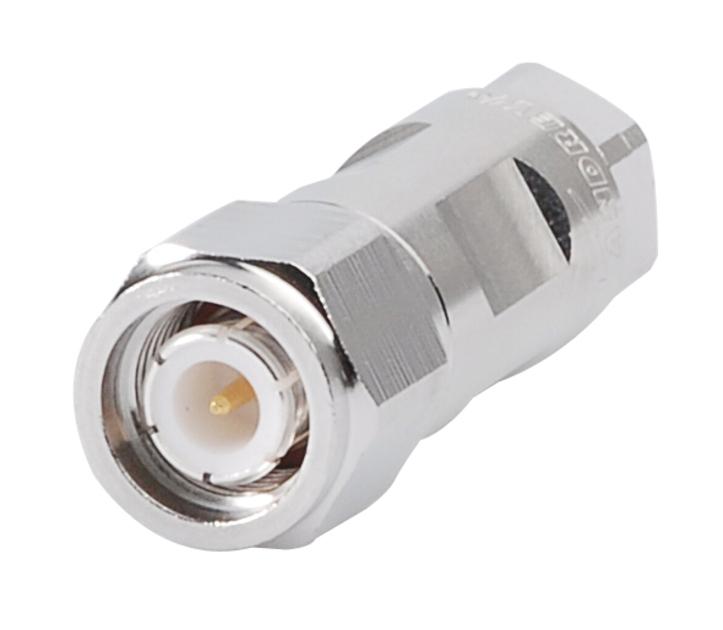 Metal connector with a threaded design and central pin.