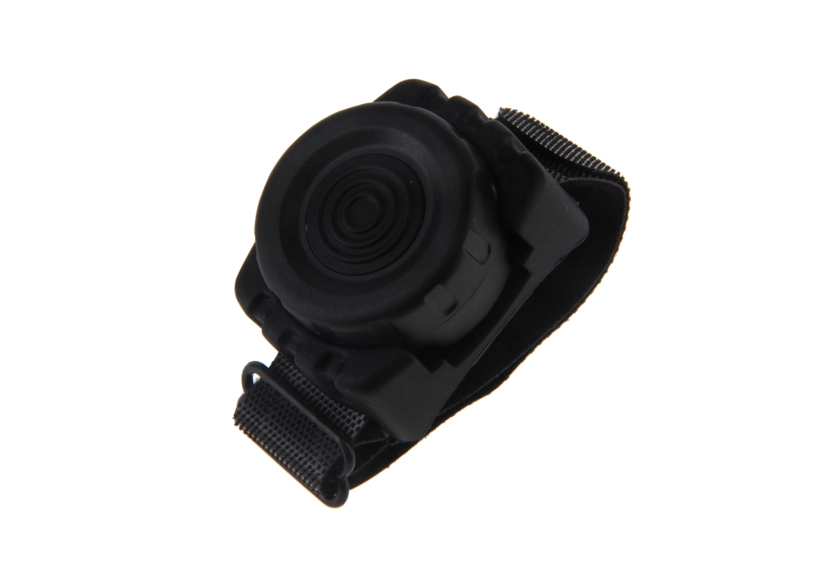 Interrupteur rond noir avec attache Velcro.