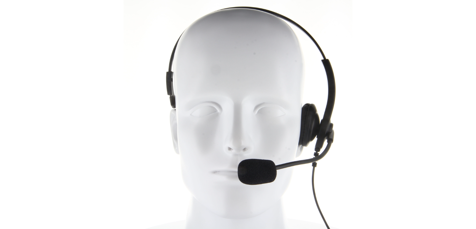 Stoffen hoofd met headset en microfoon.
