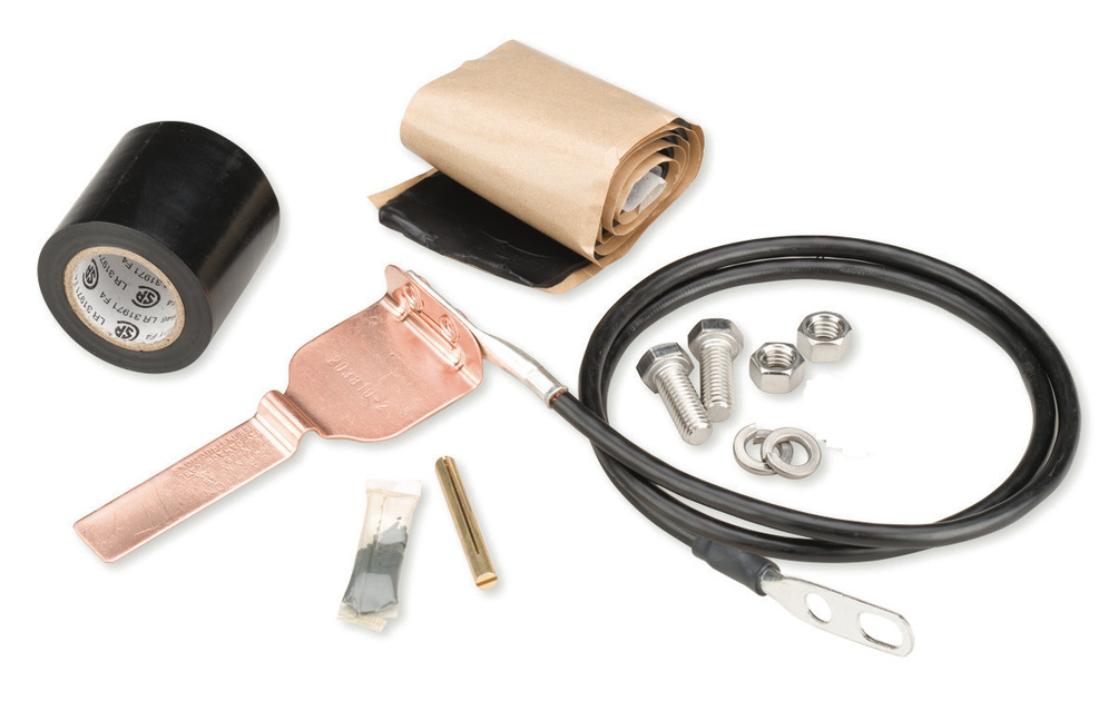 Set with black tape, cable, metal nuts, bolts, and accessories.