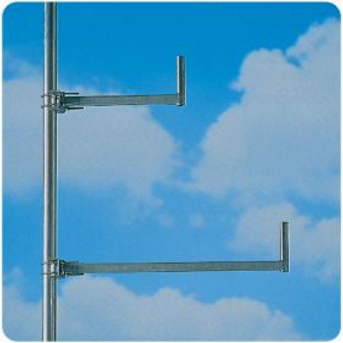 Two metal brackets on a pole against a blue sky.