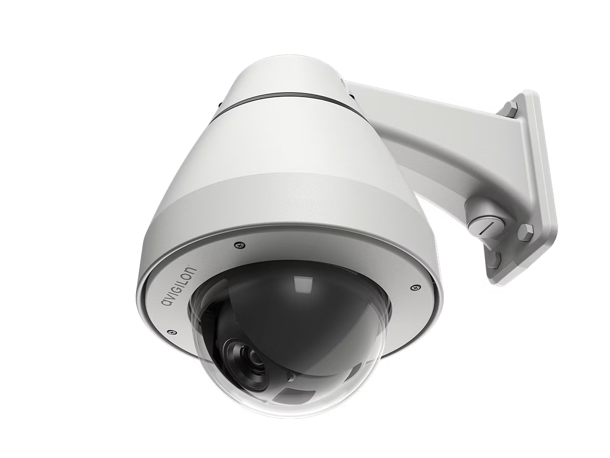 White surveillance camera with mount, facing downward.