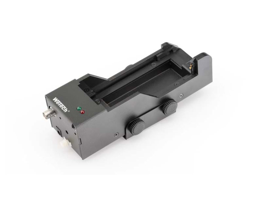 Black optical alignment stage with two knobs and connectors.