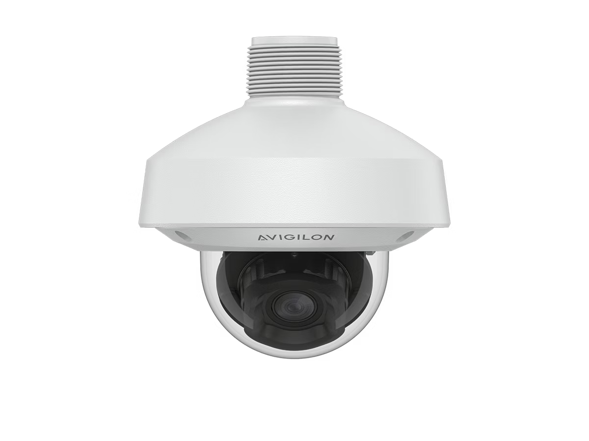 Security camera with dome-shaped housing and label.