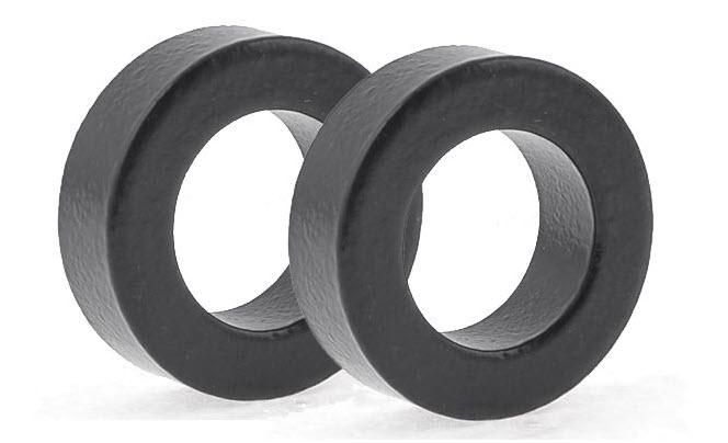 Two black magnetic rings side by side.