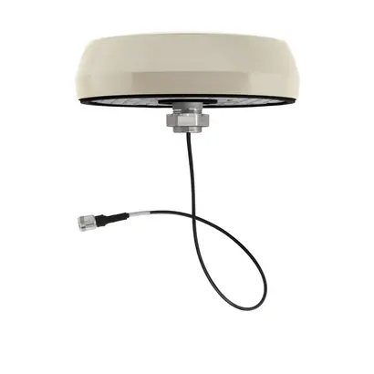 Ronde, beige antenne met kabelaansluiting aan de onderzijde.