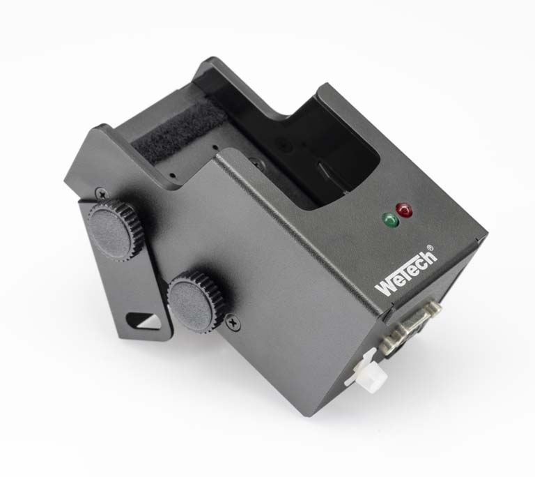 Black electronic device with knobs and LEDs.