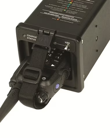 Charger with inserted radio and status indicators.