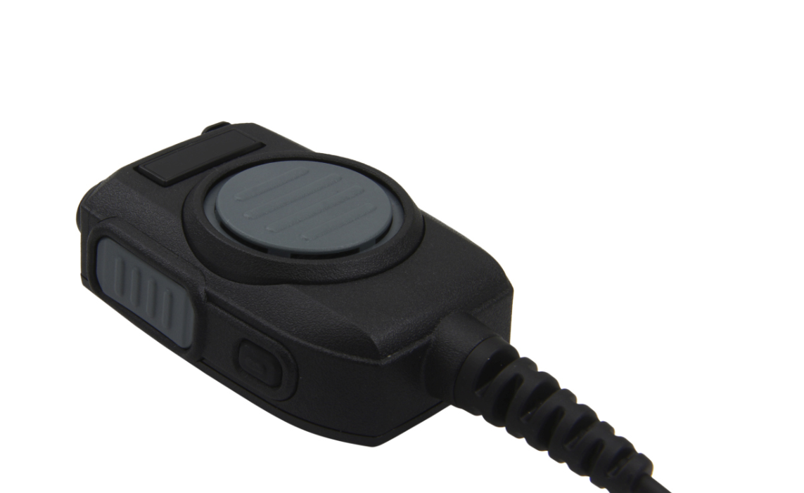 Zwart microfoon met drukknop en spiraalkabel.