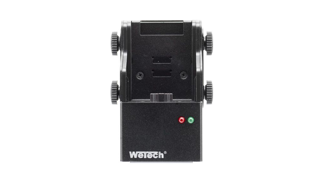 Black colored technical device with knobs and LEDs.