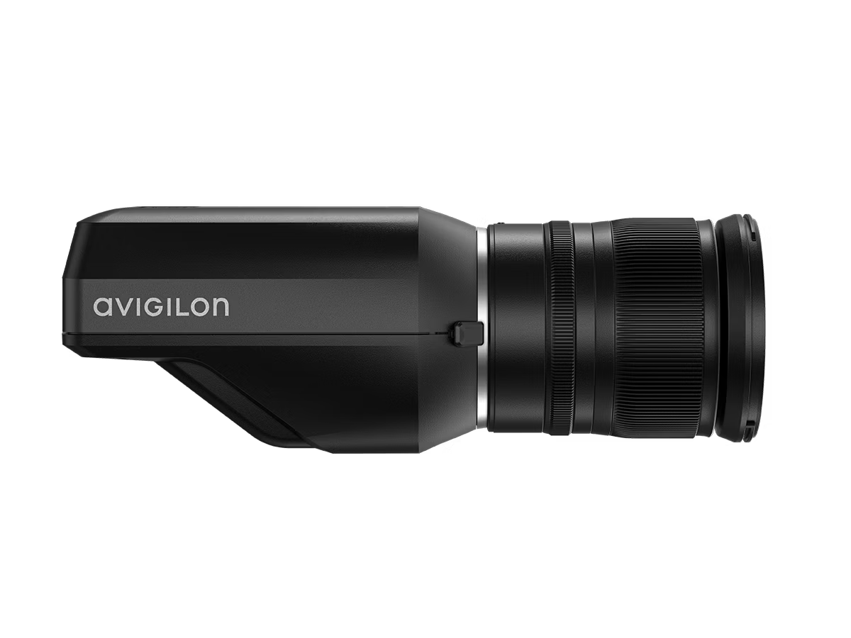 Side view of a black camera with lens, Avigilon brand.