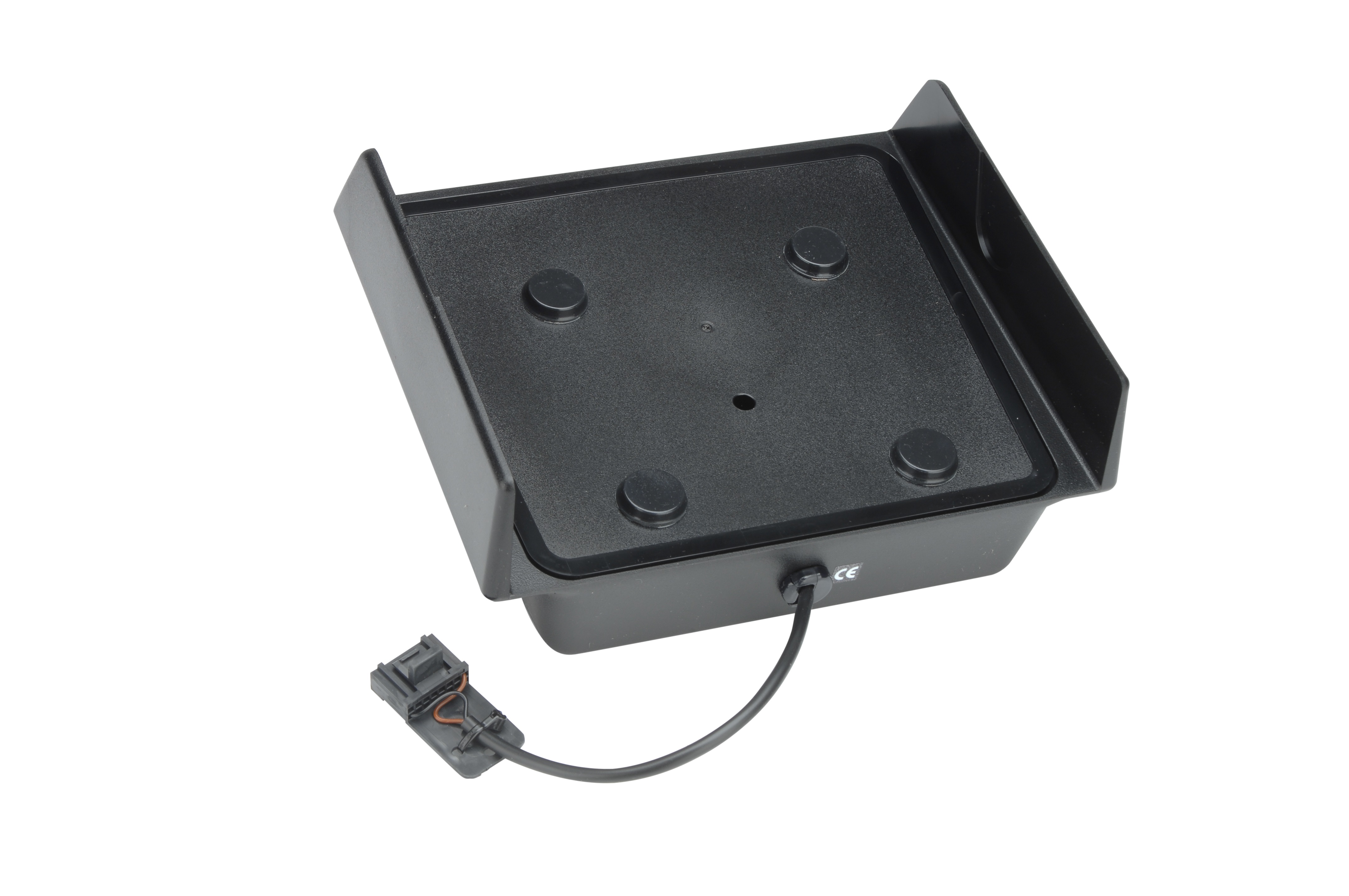 Support en plastique noir avec câble et fiche. Quatre pieds en caoutchouc dessous.