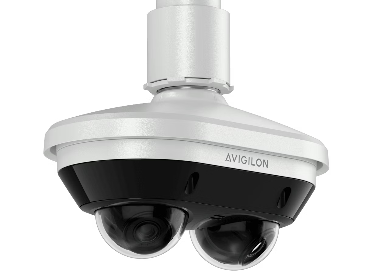 White security camera with two lenses, ceiling mount.