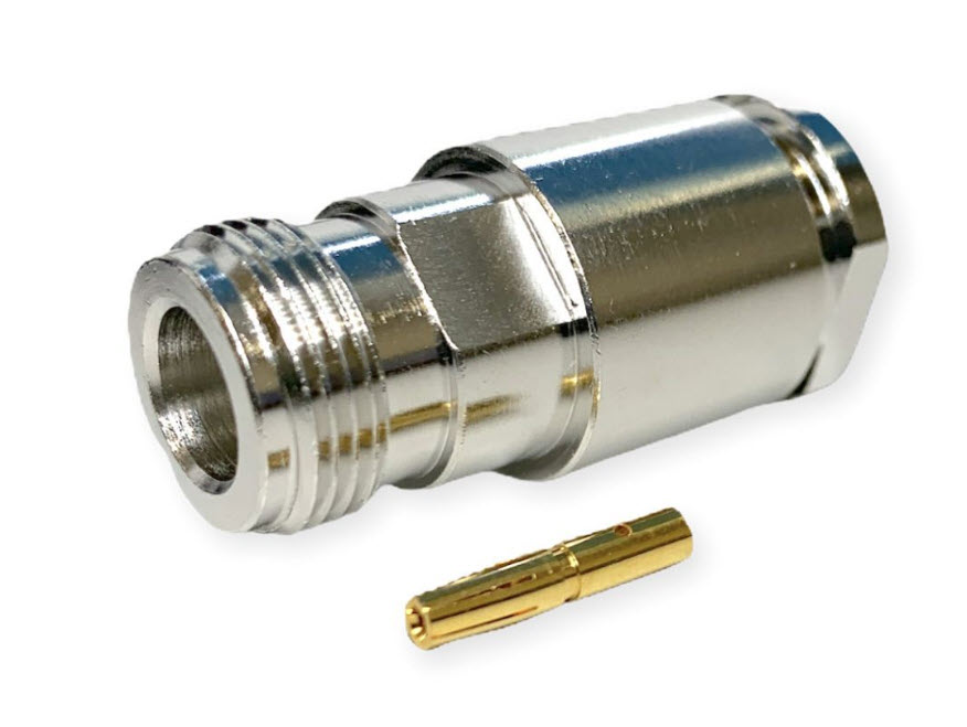 Metal connector with a separate gold pin.