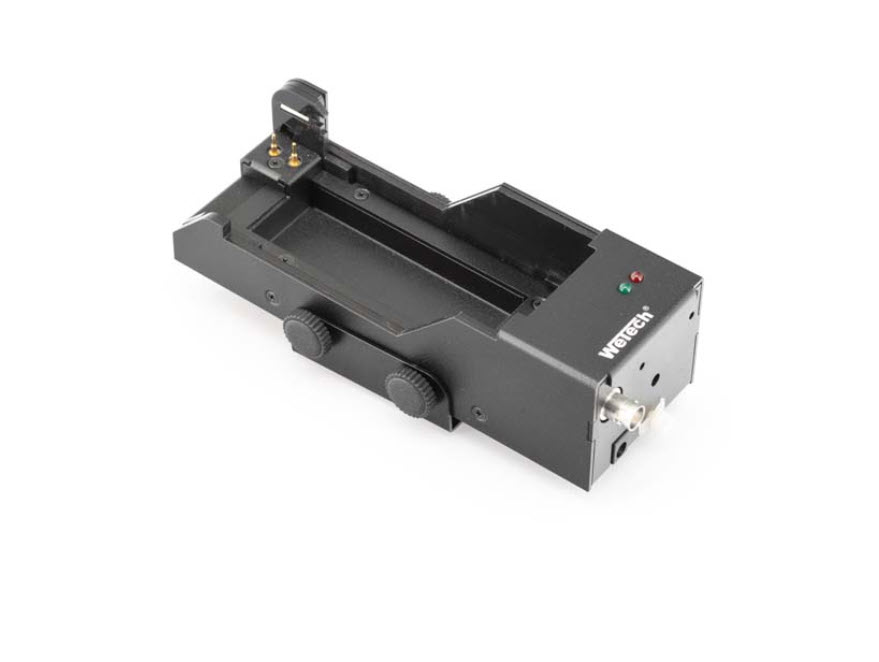 Electronic charger with indicator lights and connector.