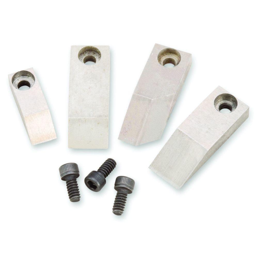 Four metal wedges with holes, three black screws below.