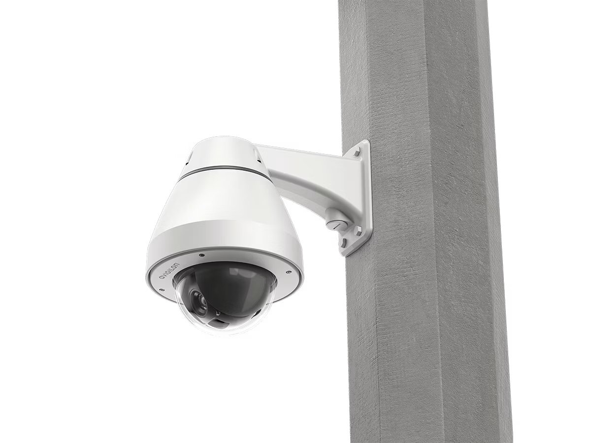 Surveillance camera mounted on a wall.