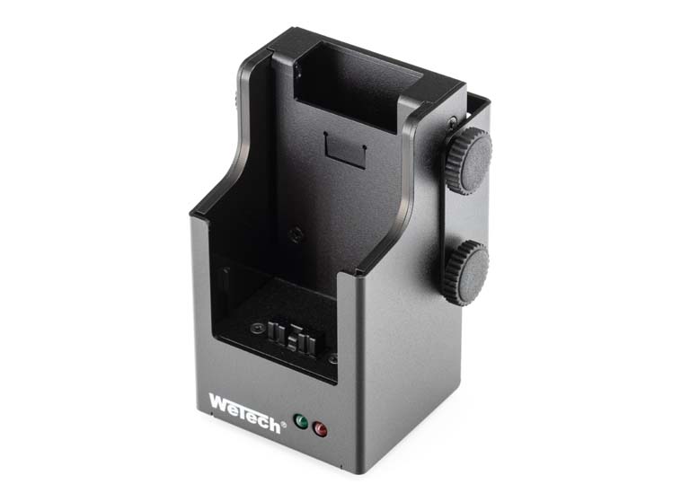 Black electronic mount with two side knobs and LED indicators.