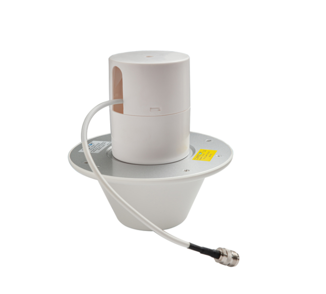 7000-00751601_com_01.png Een cilindrisch wit apparaat met kabel en stekker, gemonteerd op een ronde basis.