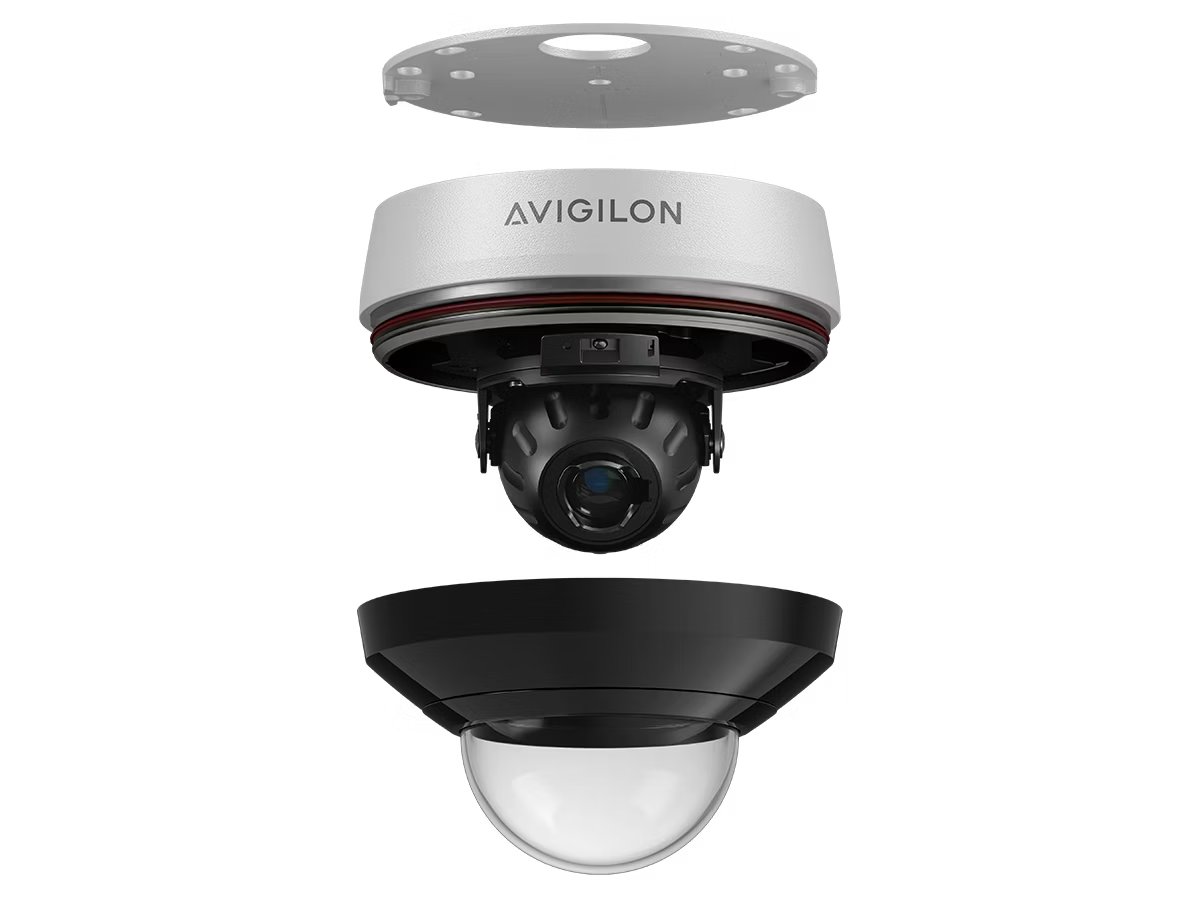 Exploded view of a security camera with cover and lens.