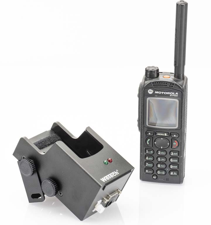 Two-way radio and charger on white background.