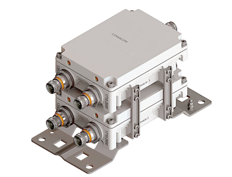 Stacked white network modules with metal connectors and brackets.