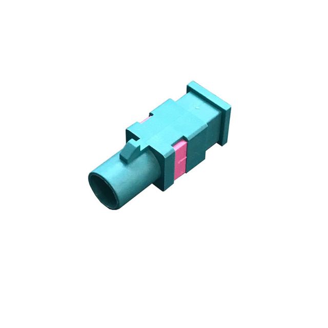 Blauwe en roze kunststofconnector met rechthoekige behuizing.