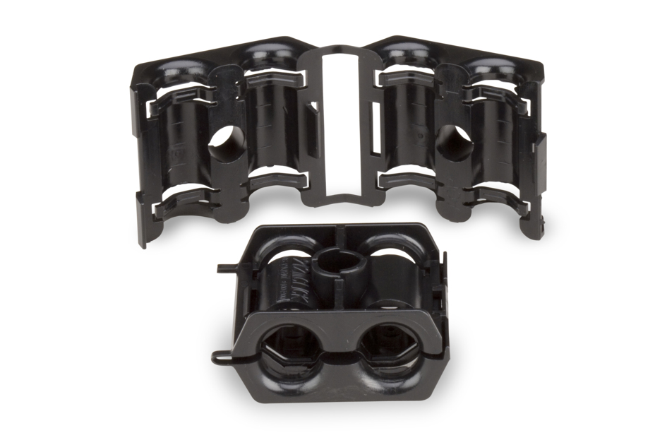 Black plastic holder with round openings, unfolded.