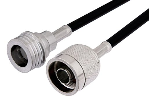 Two coaxial connectors and cables, one with knurled surface.