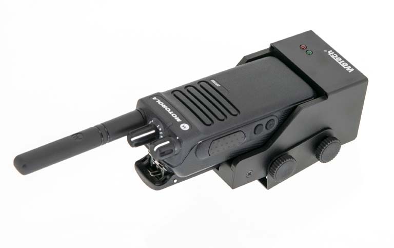Black walkie-talkie with antenna and two dials.