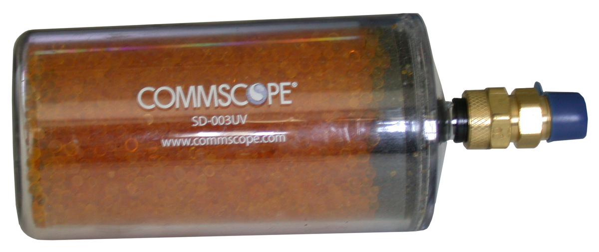 Cylindre transparent avec perles orange et connecteur métallique.