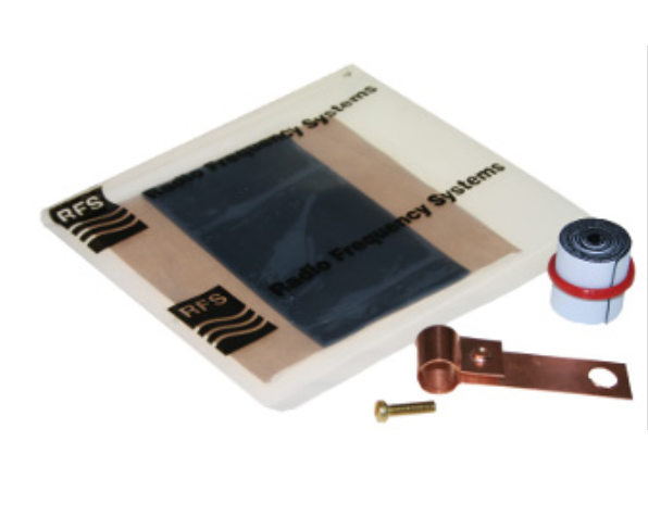 Antenna with copper element, screw, and cable coil on white background.