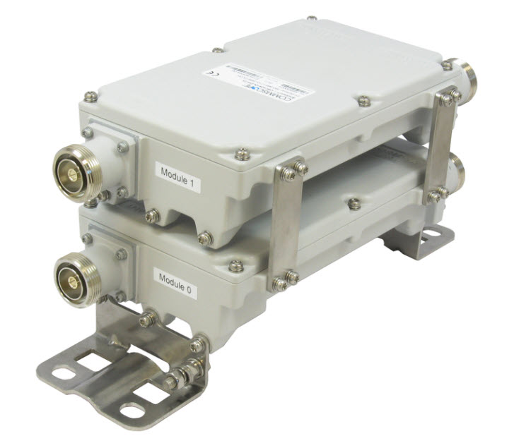 Two stacked communication modules with metal housings on a mounting bracket.