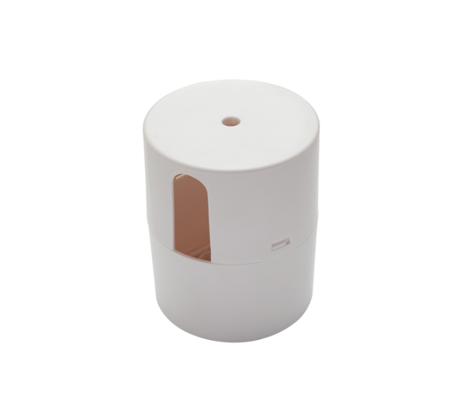 Witte cilindrische container met gat en zijraam.