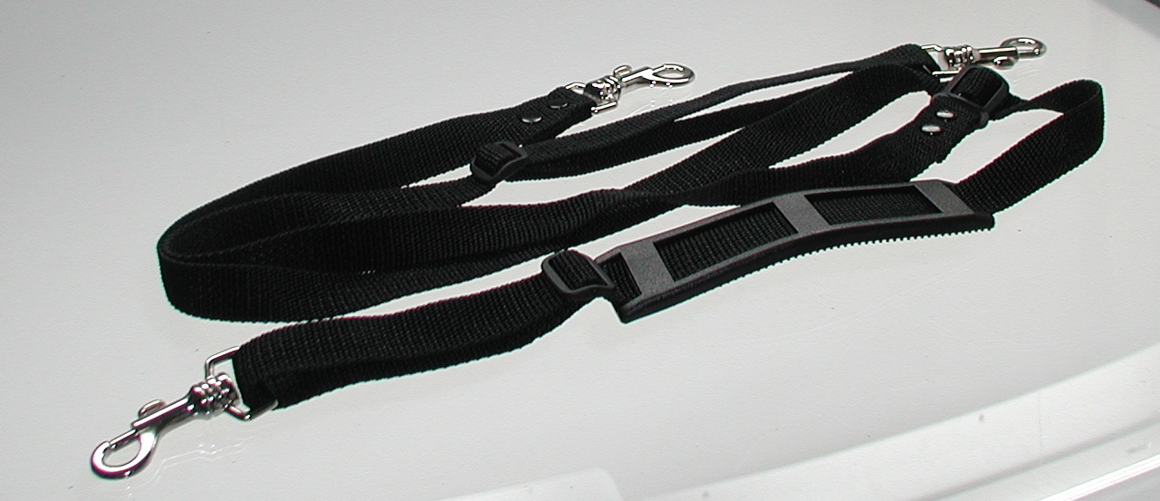 Black shoulder strap with carabiners on white background.