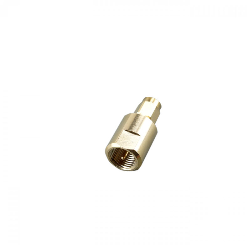 Golden adapter with threaded and round opening.