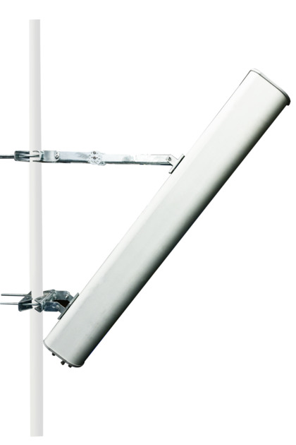 Verticale, cilindervormige antenne op een paal gemonteerd.