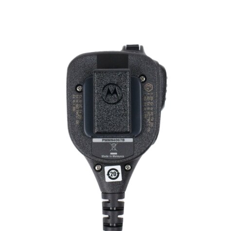 Rear view of a walkie-talkie with belt clip, serial number at bottom.