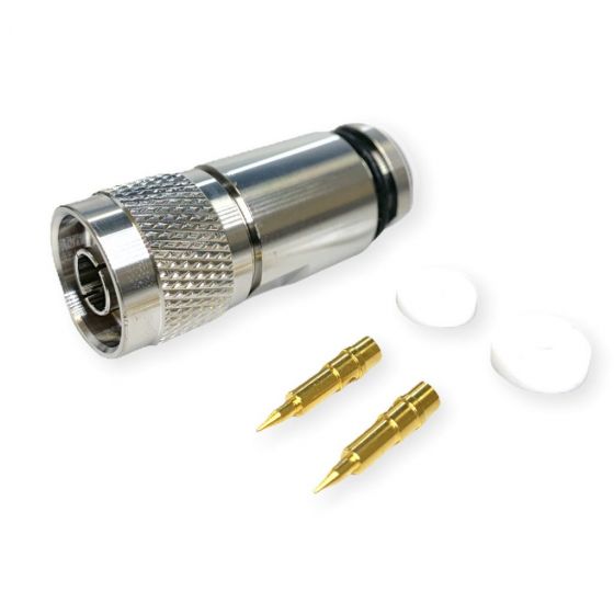 Coaxiale connector met twee gouden contacten en twee witte schijven.