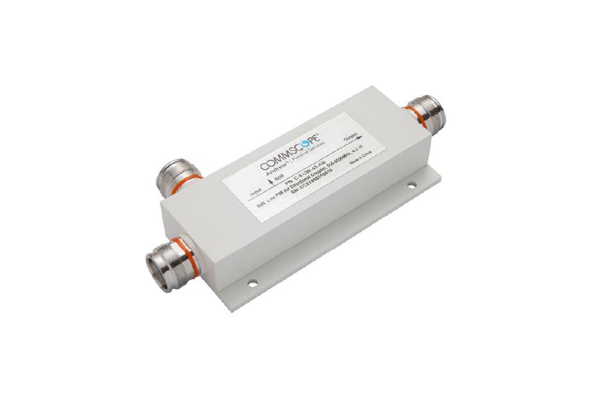 White RF power divider with two connectors and label on top.