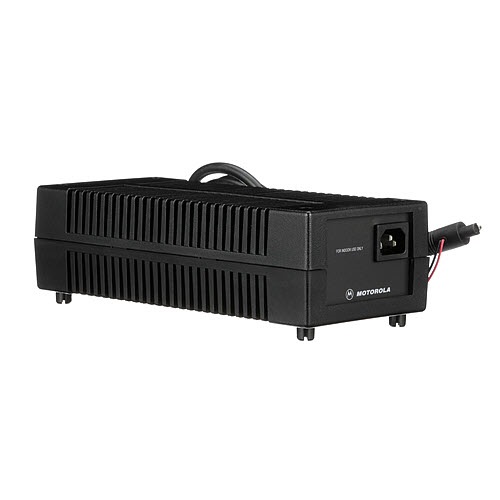 Black electronic device with ventilation grills and cable connection.