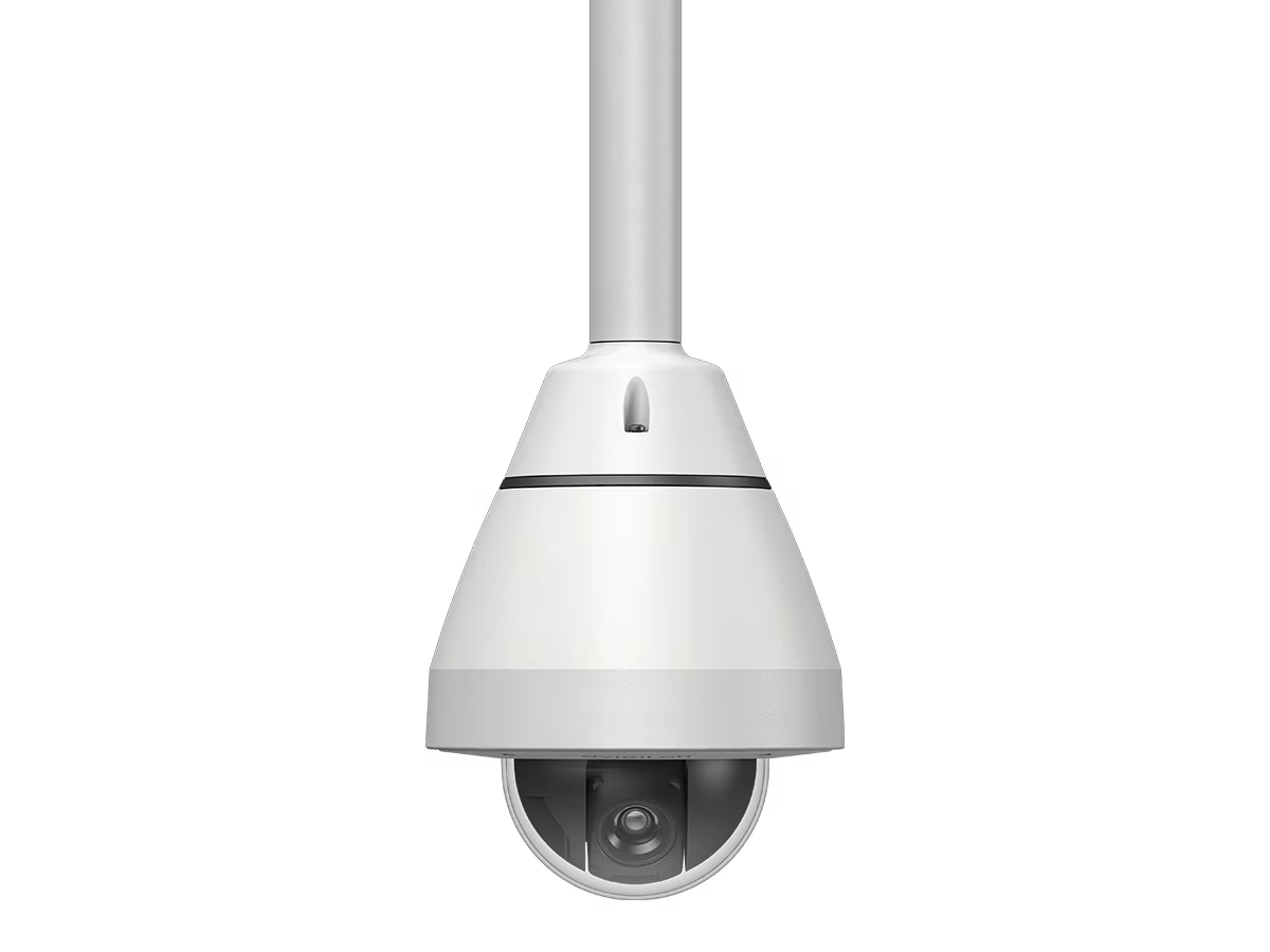 White security camera on black background